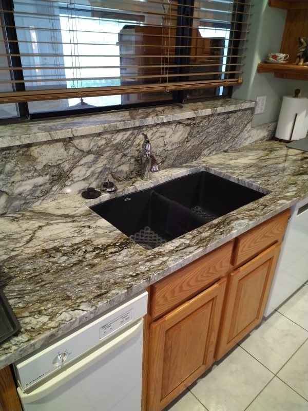 Kitchen with granite counter and undermount sink